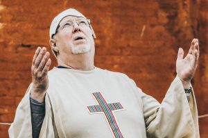 Priest At Work